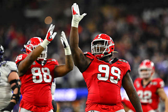 Georgia defensive line celebrates after a sack.