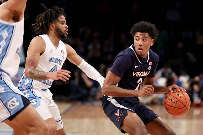 Virginia Cavaliers guard Reece Beekman and North Carolina Tar Heels guard R.J. Davis