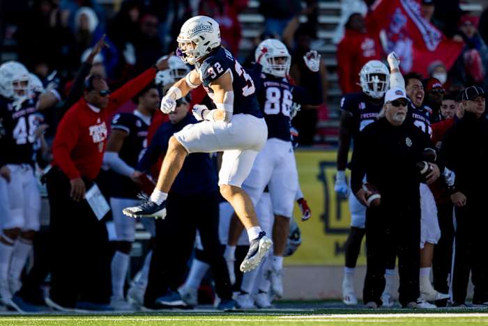 Evan Williams celebrates a turnover against UTEP in the 2021 New Mexico Bowl.