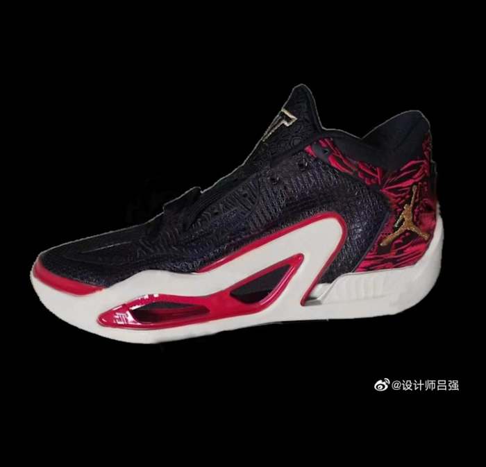 View of black, red, and white Jordan shoe.