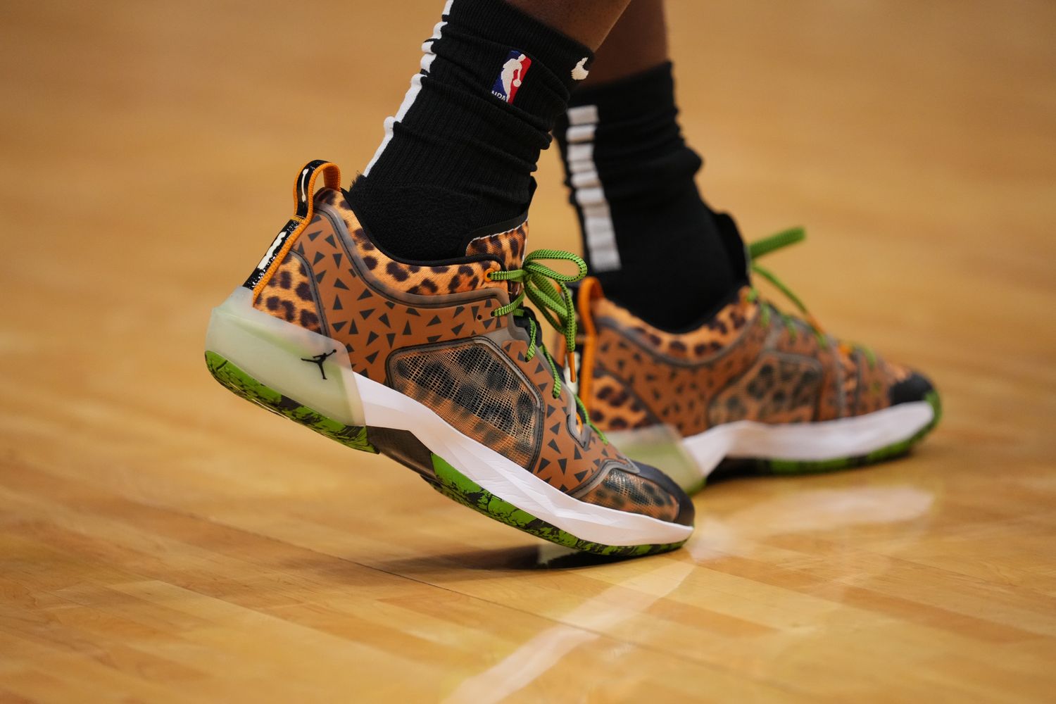 View of cheetah-print Jordan shoes.