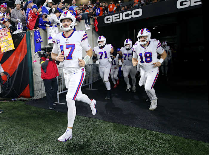 Jan 2, 2023; Cincinnati, Ohio, USA; Buffalo Bills quarterback Josh Allen (17) leads his teammates onto the field before the game against the Cincinnati Bengals at Paycor Stadium. Mandatory Credit: Joseph Maiorana-USA TODAY Sports