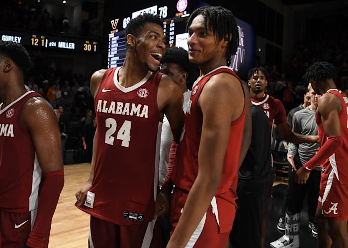 Alabama Crimson Tide forward Brandon Miller (24) and forward Noah Clowney (15) celebrate after a win against the Vanderbilt Commodores at Memorial Gymnasium.