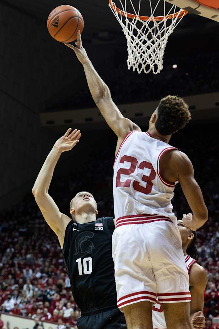 Trayce Jackson-Davis (23) blocks the shot of Michigan State Spartans forward Joey Hauser (10) in the second half at Simon Skjodt Assembly Hall.