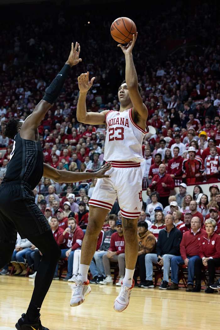 Trayce Jackson-Davis (23) shoots the ball while Michigan State Spartans center Mady Sissoko (22) attempts to block.