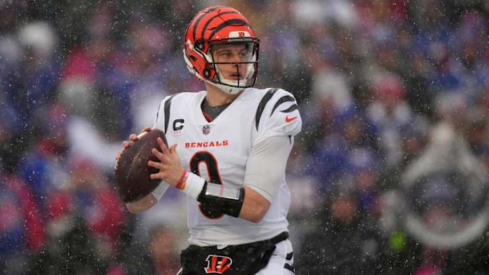 Cincinnati Bengals quarterback Joe Burrow (9) looks to throw in the first quarter during an NFL divisional playoff football game between the Cincinnati Bengals and the Buffalo Bills, Sunday, Jan. 22, 2023, at Highmark Stadium in Orchard Park, N.Y. Cincinnati Bengals At Buffalo Bills Afc Divisional Jan 22 0175
