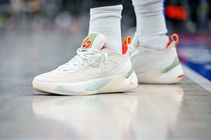 View of white and red Jordan Luka shoes.