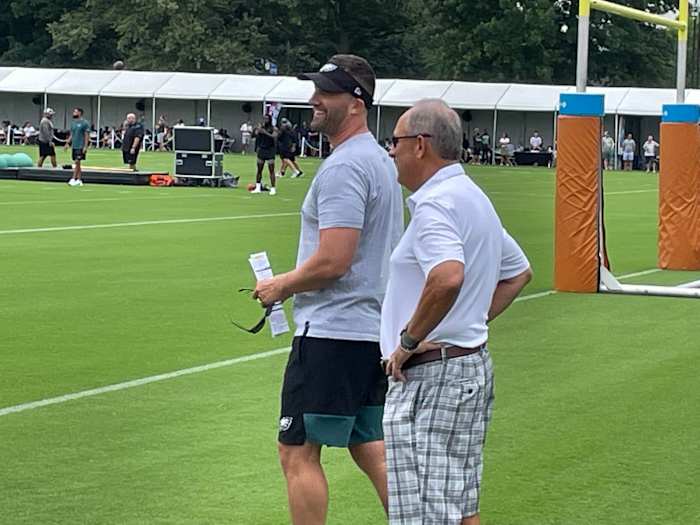 Vic Fangio visits with Nick Sirianni at training camp