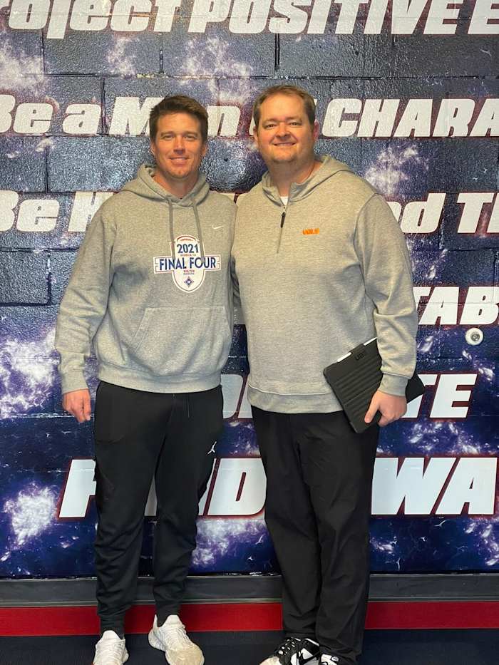 Josh Heupel with Walton head coach Daniel Brunner.