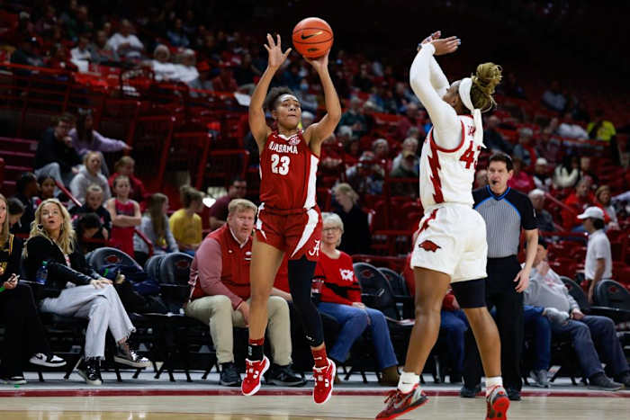 Alabama Guard Brittany Davis (23) shoots a three against Arkansas at Bud Walton Arena in Fayetteville, AR on Thursday, Jan 26, 2023.