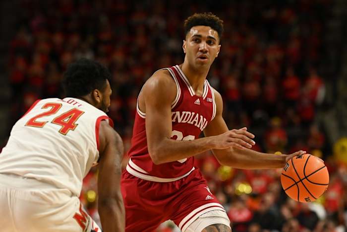 Indiana Hoosiers forward Trayce Jackson-Davis (23) dribbles past Maryland Terrapins forward Donta Scott (24) during the first half at Xfinity Center.
