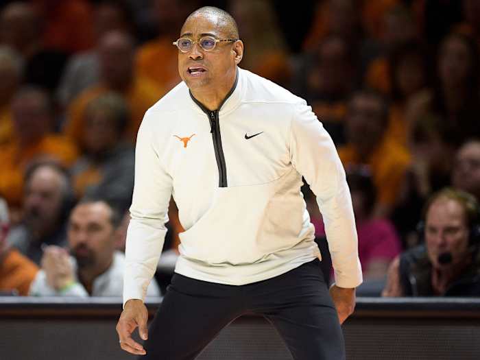 Rodney Terry stands on the Texas sideline