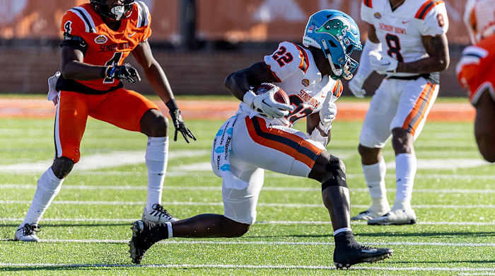 Tulane running back Tyjae spears carries the ball at the Senior Bowl