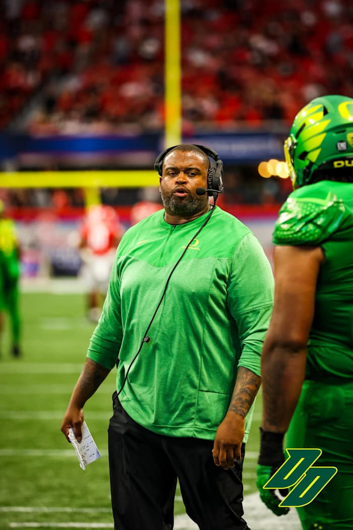 Oregon offensive line coach Adrian Klemm coaching vs. the Georgia Bulldogs in Atlanta.