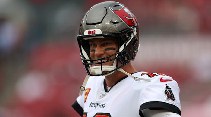 Buccaneers quarterback Tom Brady (12) warms up before a game against the Panthers.
