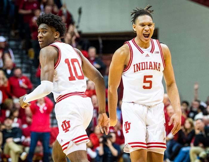 Indiana's Malik Reneau (5) celebrates Kaleb Banks (10) dunk during the first half of the Indiana versus Purdue men's basketball game at Simon Skjodt Assembly Hall on Saturday, Feb. 4, 2023.