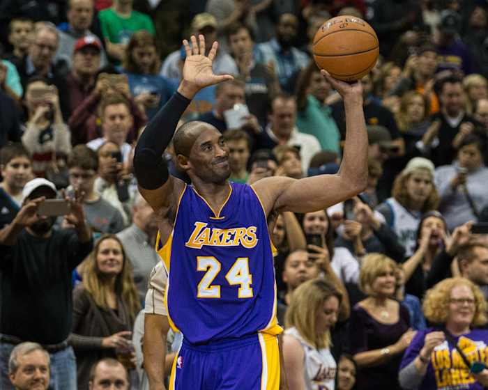 Lakers guard Kobe Bryant celebrates after scoring milestone in 2014.