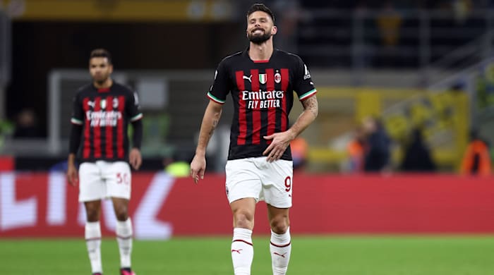 AC Milan striker Olivier Giroud reacts during a loss to Inter Milan.