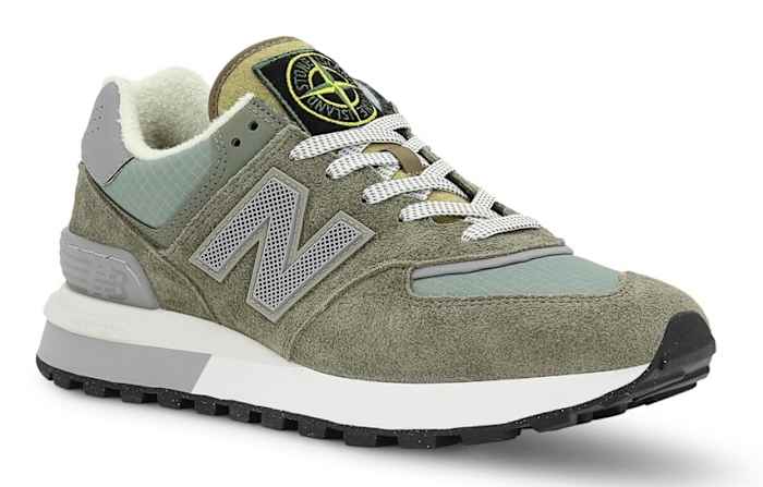 View of grey and white New Balance shoe.