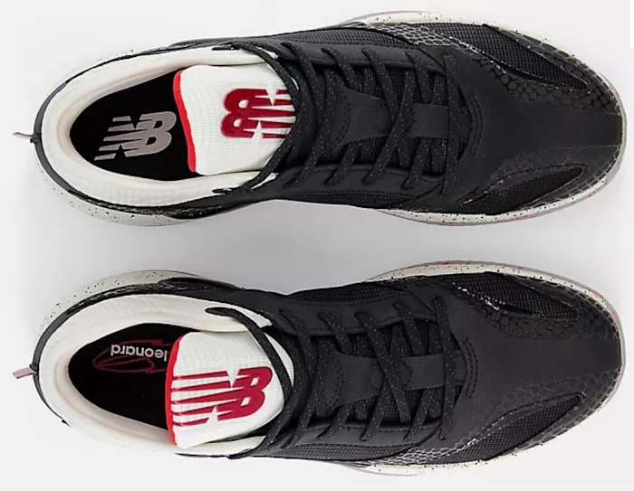 Top view of black and white New Balance shoes.