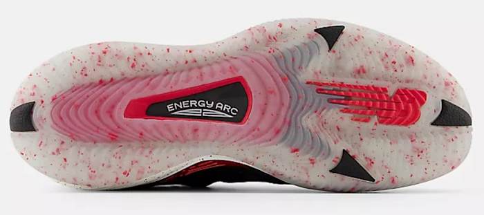 View of white and red New Balance shoe outsole.