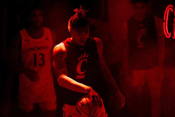 Cincinnati Bearcats guard Jeremiah Davenport (24) dribbles out onto the court before the NCAA men s basketball game between the Cincinnati Bearcats and East Carolina Pirates at Fifth Third Arena in Cincinnati on Wednesday, Jan. 11, 2023. Ncaa Basketball Eastern Carolina Pirates At Cincinnati Bearcats