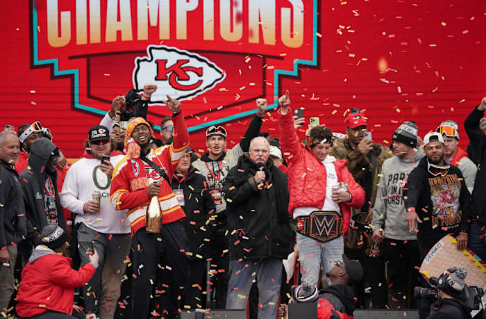 Feb 15, 2023; St. Louis, MO, USA; Kansas City Chiefs head coach Andy Reid celebrates with quarterback Patrick Mahomes (15) and other players during the Kansas City Chiefs Super Bowl parade. Mandatory Credit: Denny Medley-USA TODAY Sports