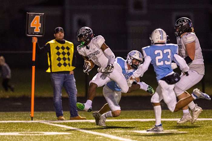 Northwood's NiTareon Tuggle (3) rums with the ball for yardage during the Northwood-South Bend Saint Joseph high school football game on Friday, October 28, 2022, at Father Bly Field in South Bend, Indiana. Northwood Vs South Bend Saint Joseph