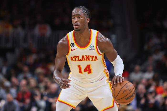 Hawks forward AJ Griffin dribbles the basketball.