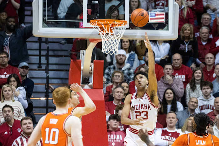 Trayce Jackson-Davis (23) shoots the ball while Illinois Fighting Illini forward Matthew Mayer (24) defends in the second half at Simon Skjodt Assembly Hall.