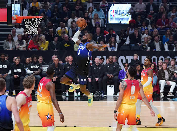 LeBron James dunks the ball during the 2023 NBA All-Star Game