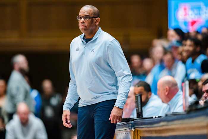 North Carolina men’s basketball coach Hubert Davis calls a play from the sideline in a game against Duke.