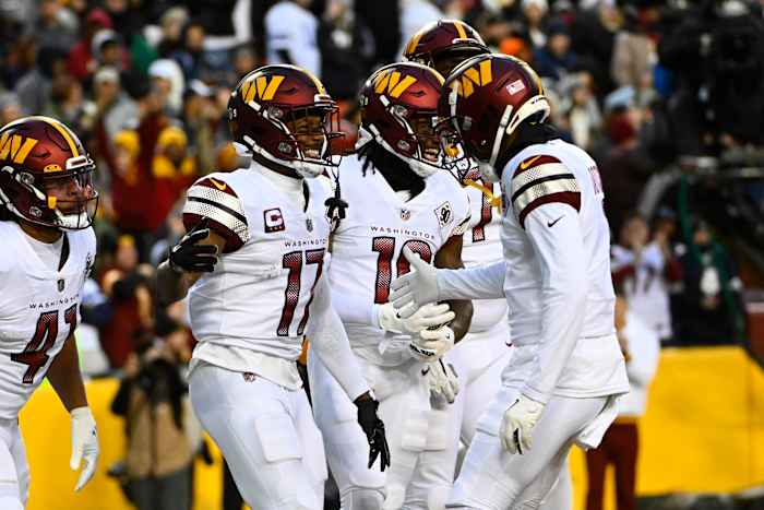 Washington Commanders receivers Terry McLaurin (17), Jahan Dotson (right), and Curtis Samuel (10)