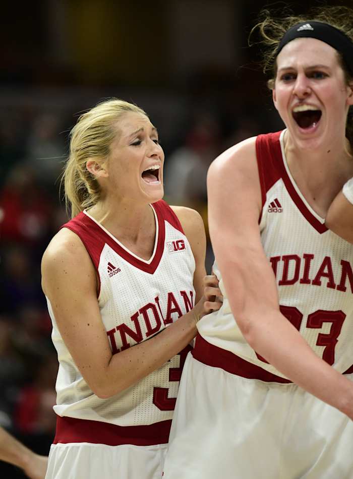 Mar 1, 2018; Indianapolis, IN, USA; Indiana Hoosiers guard Tyra Buss (3) and Indiana Hoosiers forward Amanda Cahill (33) react to a call in the third overtime during the second round of the Big Ten Conference Tournament at Bankers Life Fieldhouse. Indiana defeated Michigan State 111-109 after four overtime periods.
