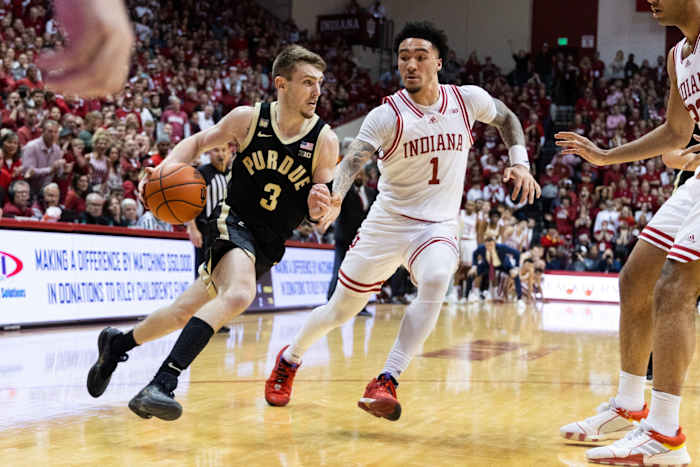Purdue Boilermakers guard Braden Smith (3) dribbles the ball while Indiana Hoosiers guard Jalen Hood-Schifino (1) defends in the second half at Simon Skjodt Assembly Hall.