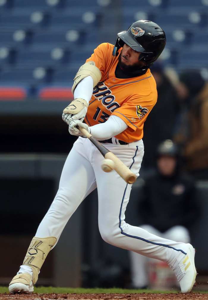 Akron RubberDucks right fielder George Valera (13) hits a shot to left field for a single during the fourth inning of an MiLB baseball game against the Altoona Curve at Canal Park on Wednesday. Duckscurve 5 © Jeff Lange / USA TODAY NETWORK