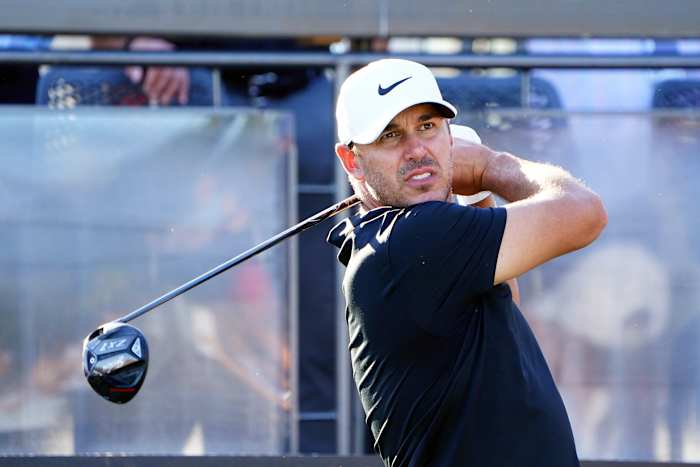 Brooks Koepka hits off the first tee during the Pro-Am tournament before the LIV Golf series at Trump National Doral.