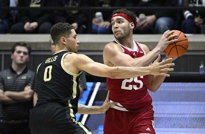 Indiana Hoosiers forward Race Thompson (25) controls the ball against Purdue Boilermakers forward Mason Gillis (0).