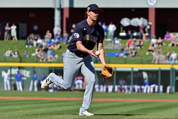 Feb 27, 2023; Mesa, Arizona, USA; Cleveland Guardians starting pitcher Shane Bieber (57) throws to first base in the first inning against the Chicago Cubs during a spring training game at Sloan Park. Mandatory Credit: Matt Kartozian-USA TODAY Sports