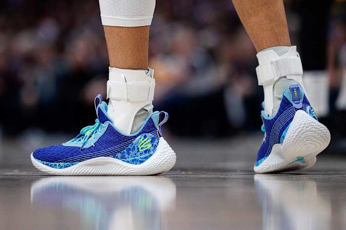 View of Stephen Curry's blue and white shoes.