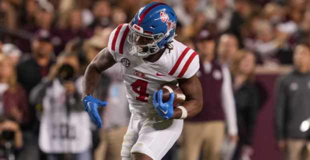Ole Miss Rebels tailback Quinshon Judkins on a carry during a college football game in the SEC.