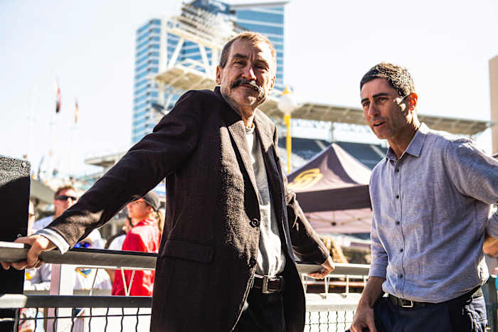 Padres owner Peter Siedler chats with his GM A.J. Preller.
