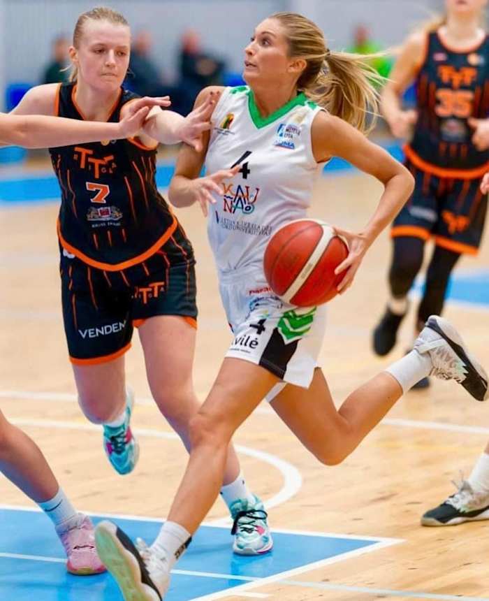 Tyra Buss drives to the basket during an Aistes-LSMU basketball game of the Lithuanian league.