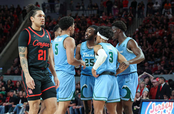 eb 22, 2023; Houston, Texas, USA; Tulane Green Wave guard Jaylen Forbes (25) talks with teammates after a play during the first half against the Houston Cougars at Fertitta Center.