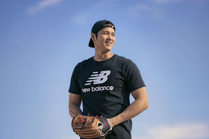 Shohei Ohtani stands on the pitcher's mound.