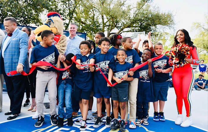 Pelicans unveil the renovated basketball court at the Cheniere Energy Boys & Girls Clubs at Columbus Circle Recreation Center.