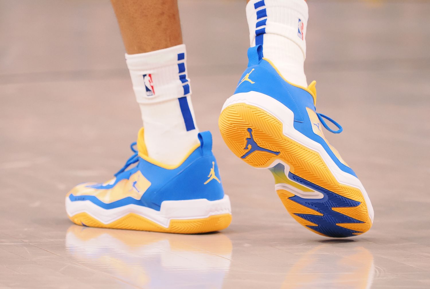 View of Russell Westbrook's blue and gold shoes.