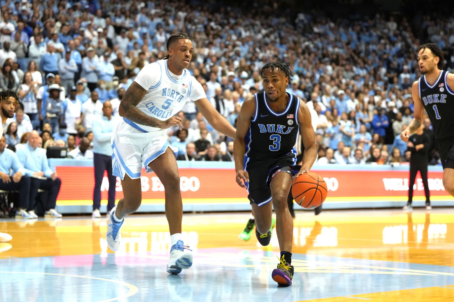 Duke Blue Devils guard Jeremy Roach dribbles past North Carolina Tar Heels forward Armando Bacot.