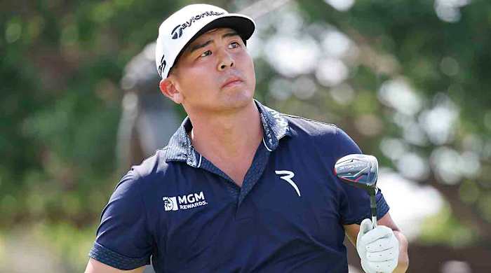 Kurt Kitayama watches a shot at the 2023 Arnold Palmer Invitational.