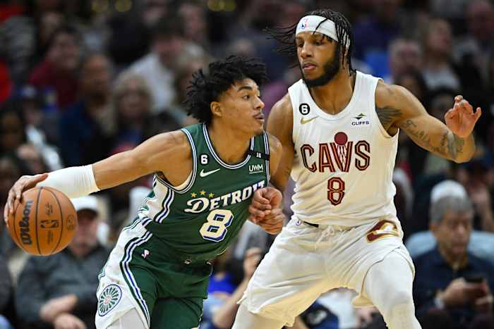 Mar 4, 2023; Cleveland, Ohio, USA; Detroit Pistons guard Jared Rhoden (8) drives against Cleveland Cavaliers forward Lamar Stevens (8) in the fourth quarter at Rocket Mortgage FieldHouse. Mandatory Credit: David Richard-USA TODAY Sports
